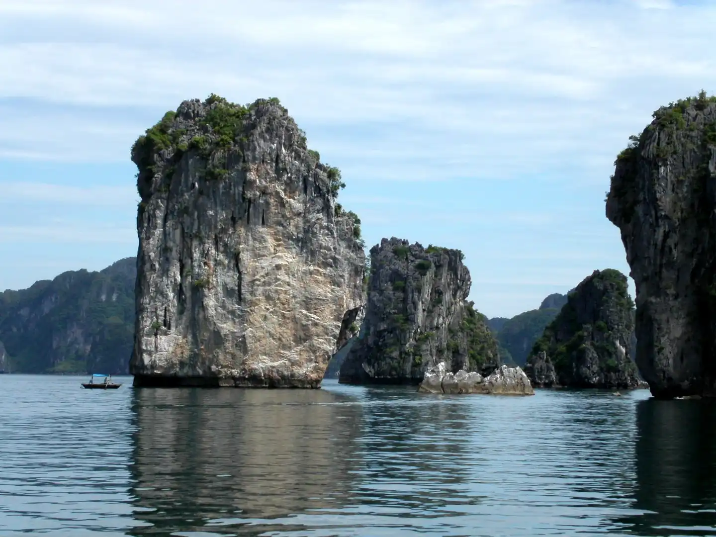 Limestone karsts rising from the water in Ha Long Bay, Vietnam